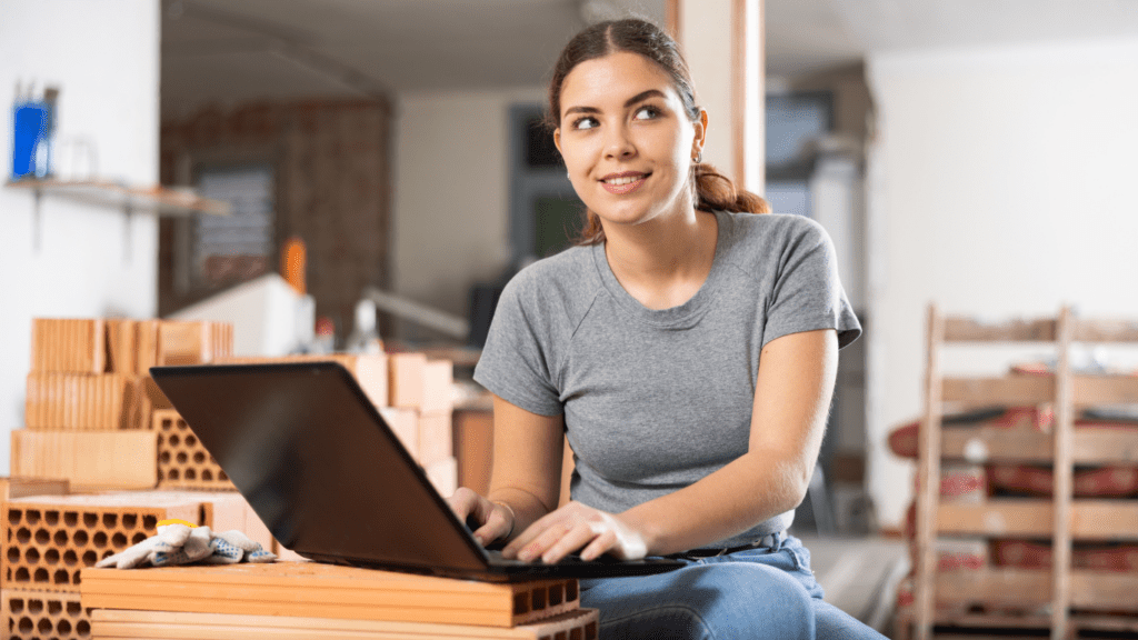 a woman using a laptop for visiting site