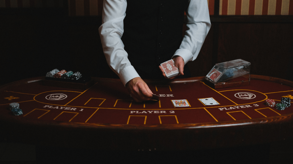 a person taking in-charge of casino game