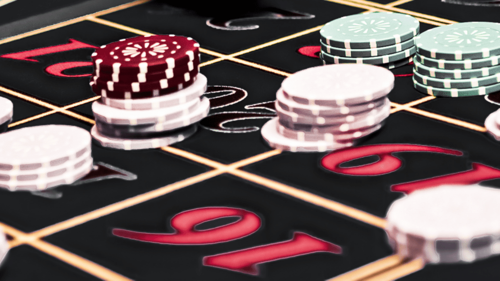 a table of casino with betting coins