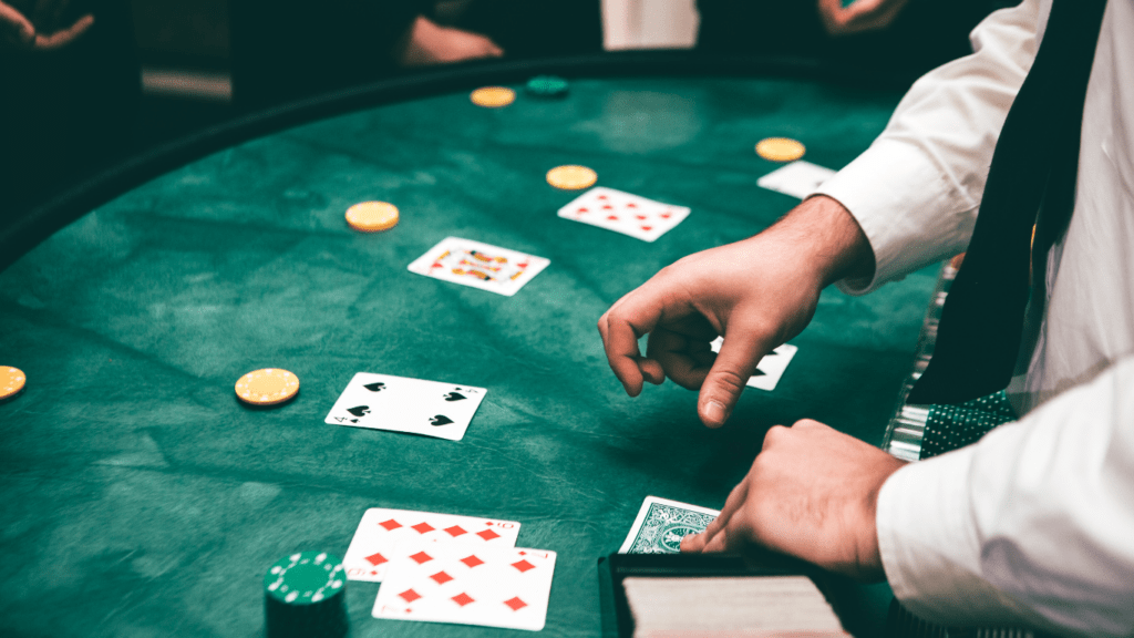 a person taking in-charge of casino game